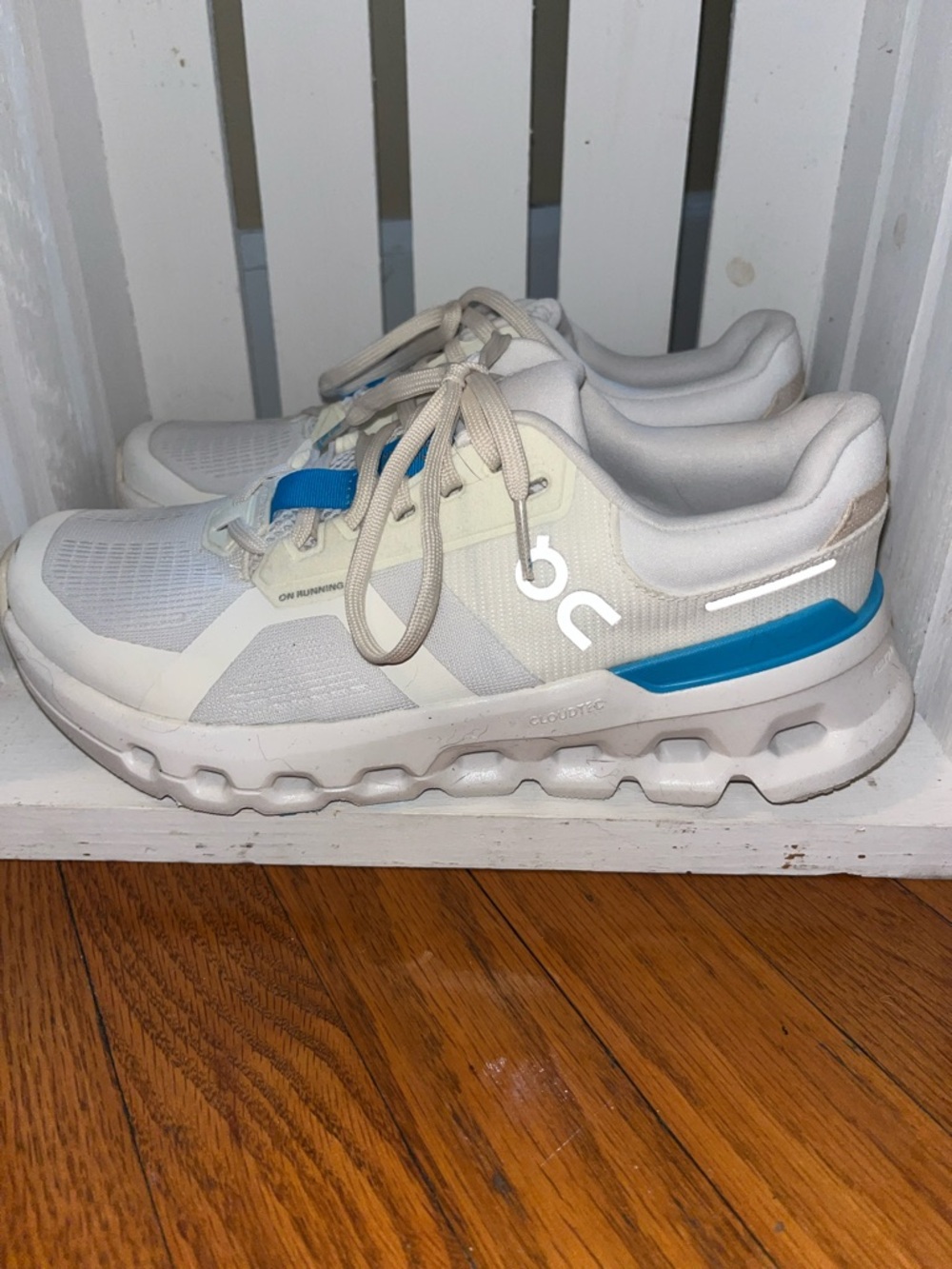 On Running White Sneakers with Blue Accents